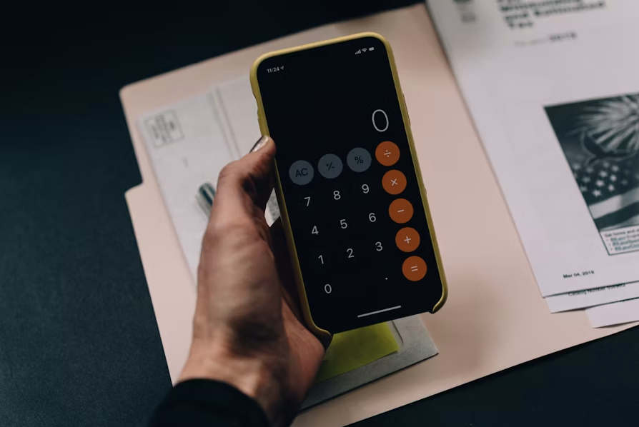 Financial planning paperwork and calculator